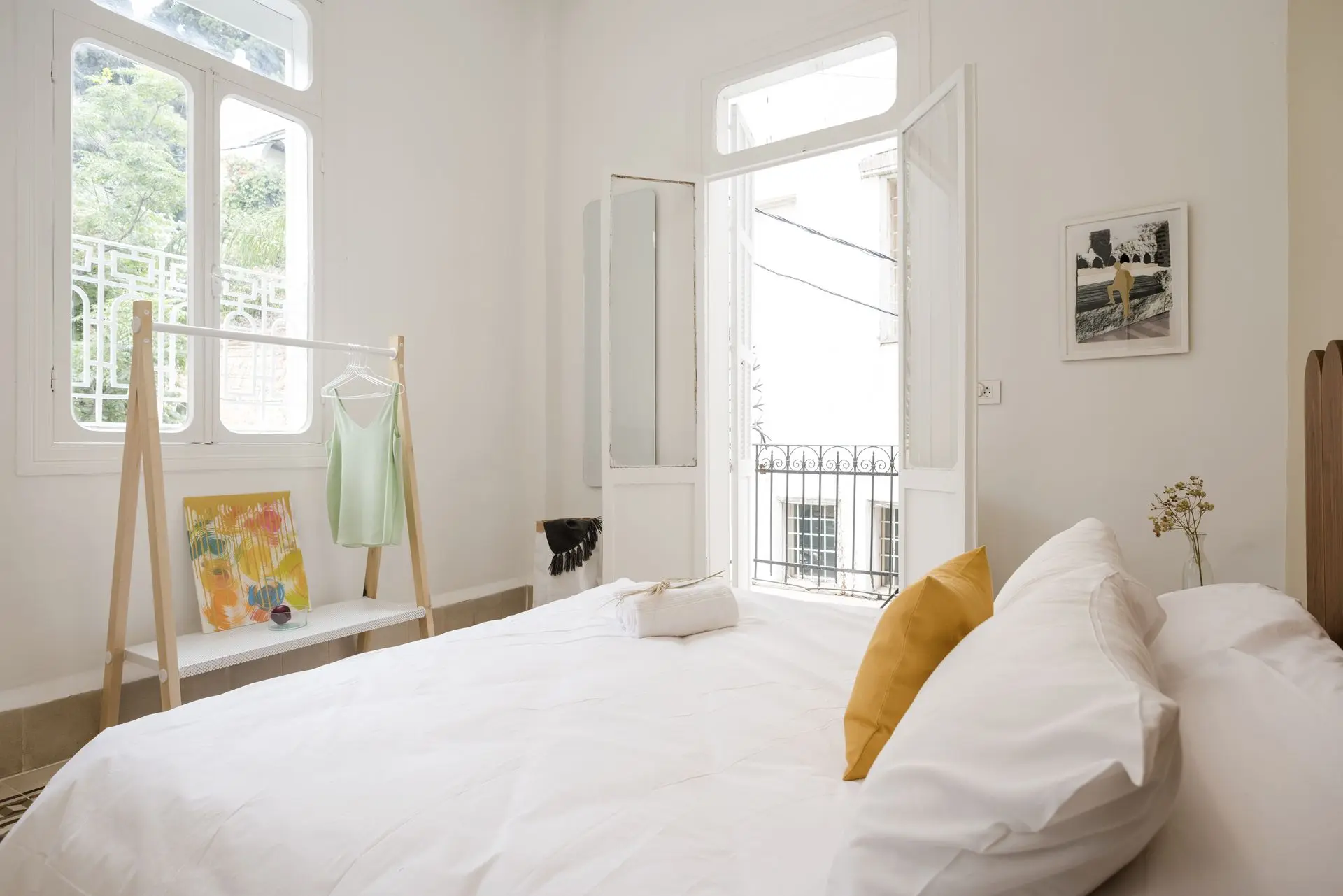alt=&#34;Living room with terrazzo flooring and potted indoor plants&#34;