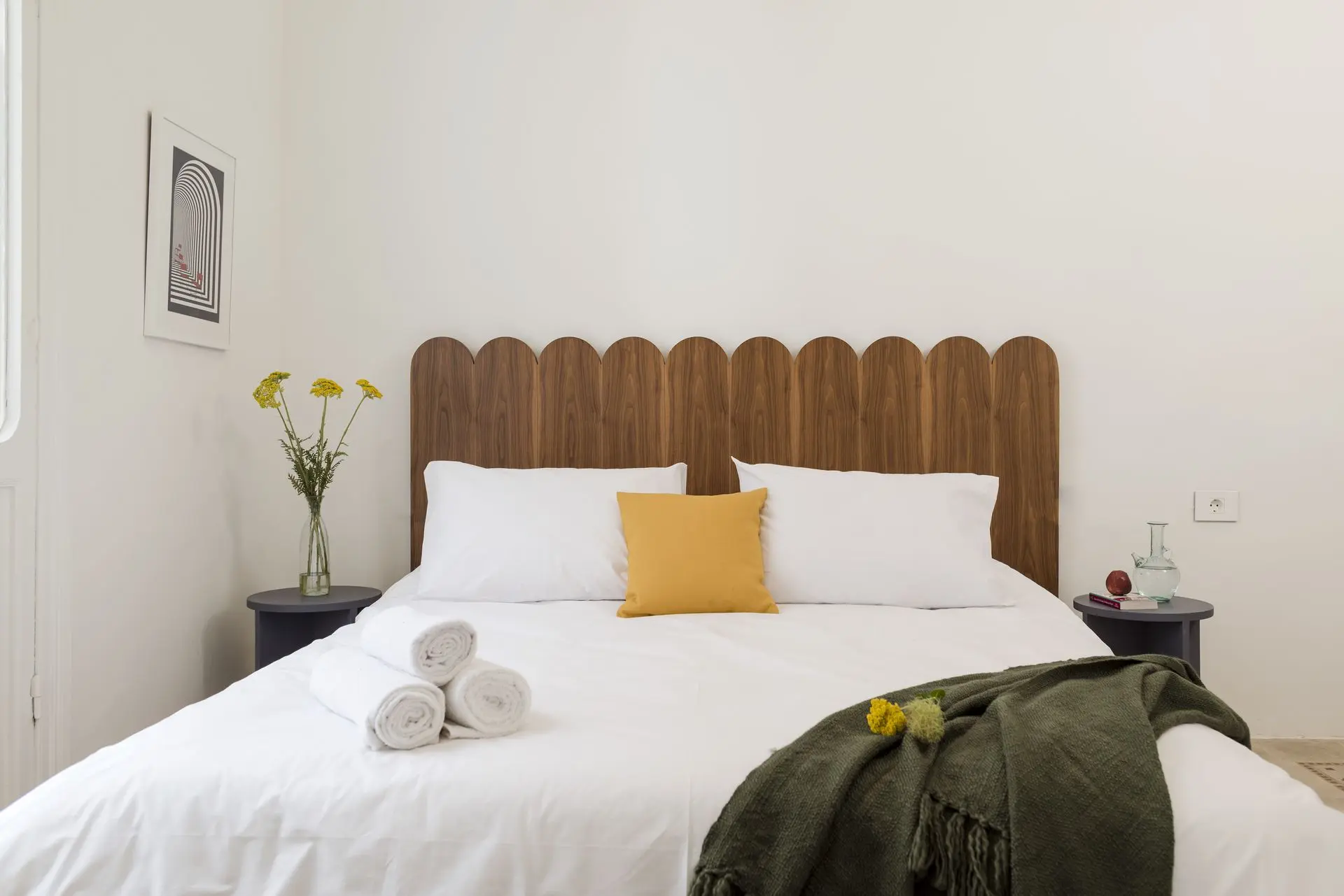 alt=&#34;White bedroom with light wood floor and modern styling&#34;