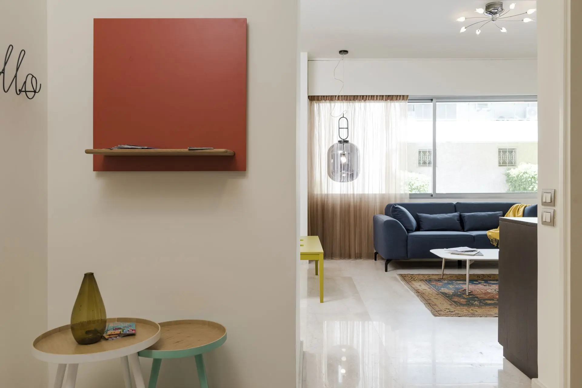 alt=&#34;Bright living room with large windows and cozy sofa&#34;