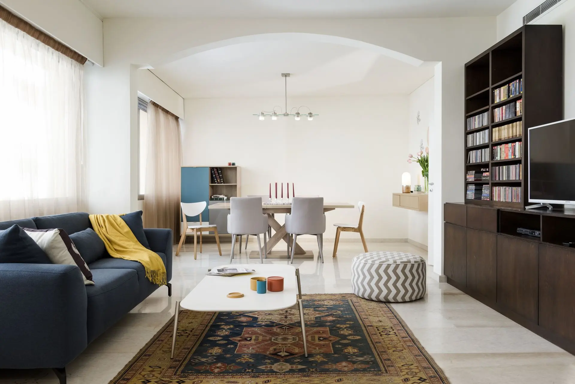 alt=&#34;Creative interior with wall art gallery and mid-century sofa&#34;