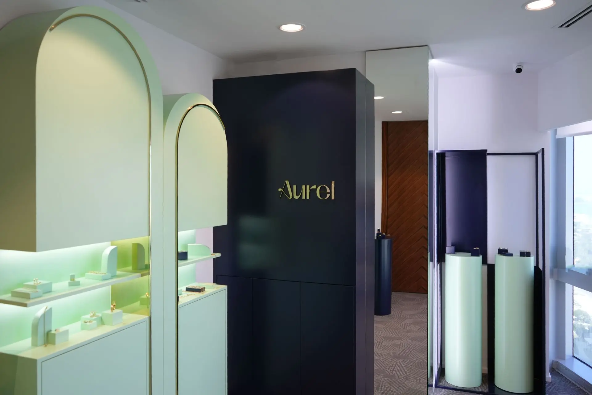 alt=&#34;Contemporary office space with large windows and neutral tones&#34;