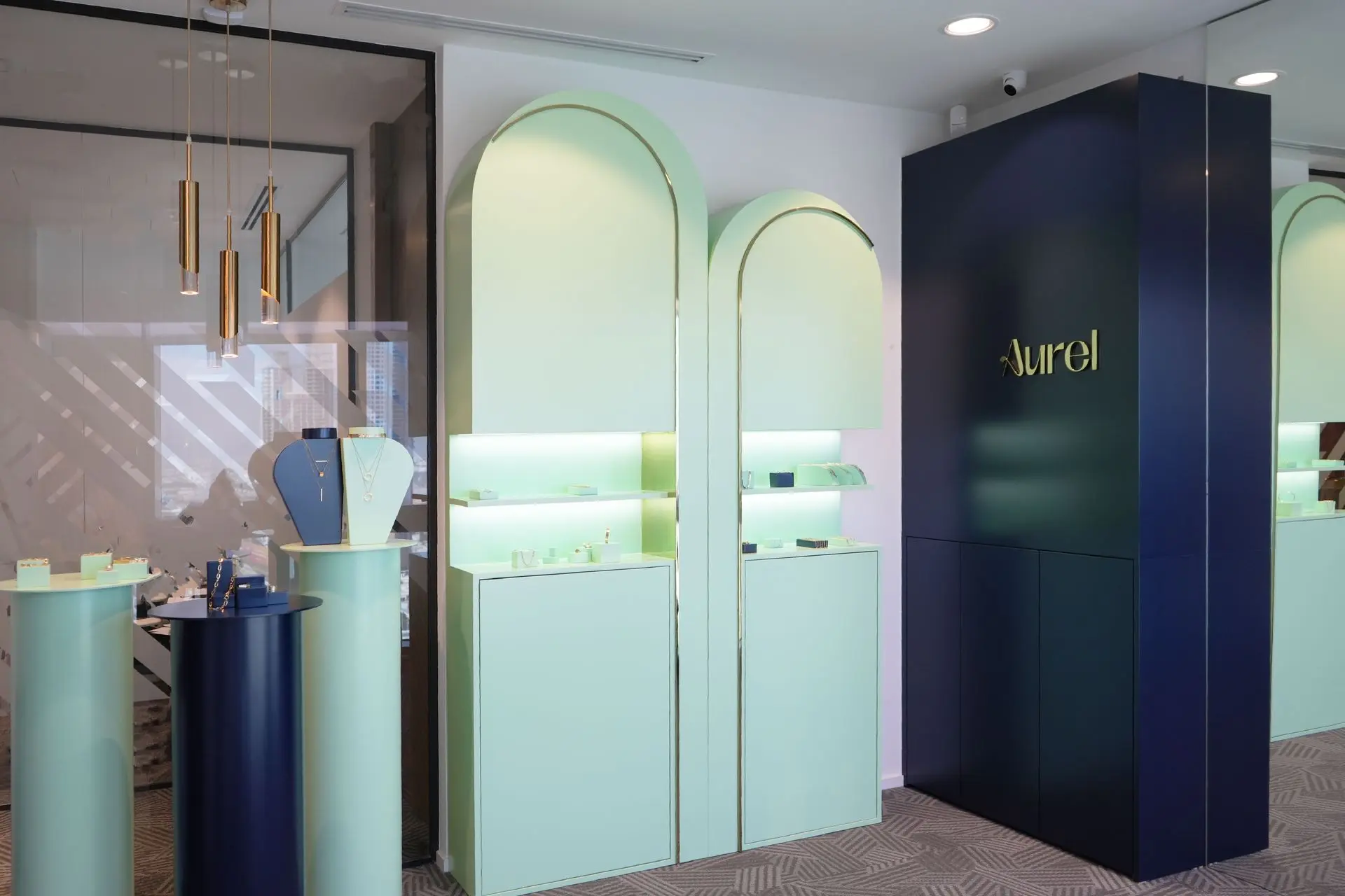 alt=&#34;Contemporary office space with large windows and neutral tones&#34;