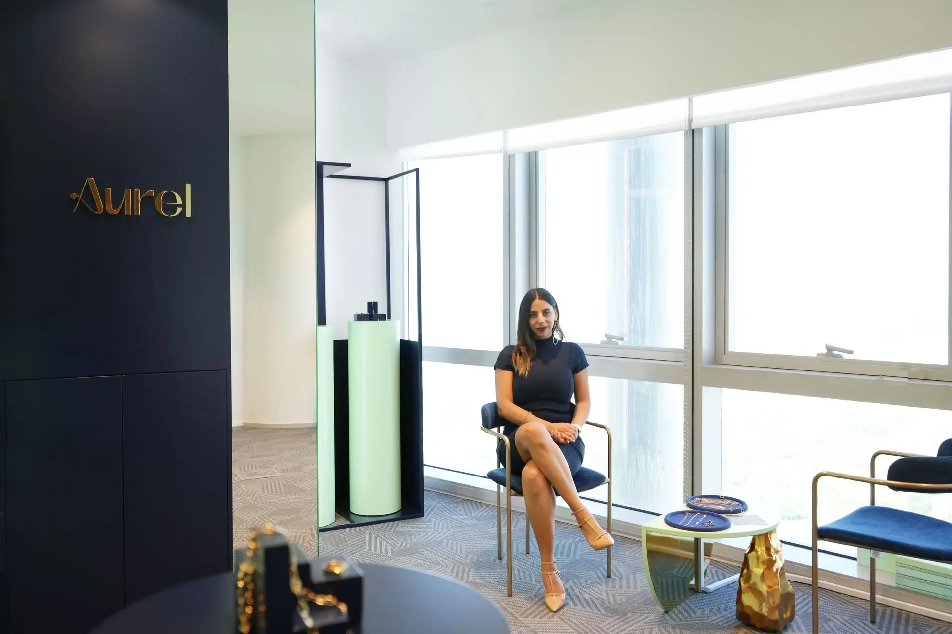 alt=&#34;Elegant Dubai interior with sculpture and floor seating&#34;