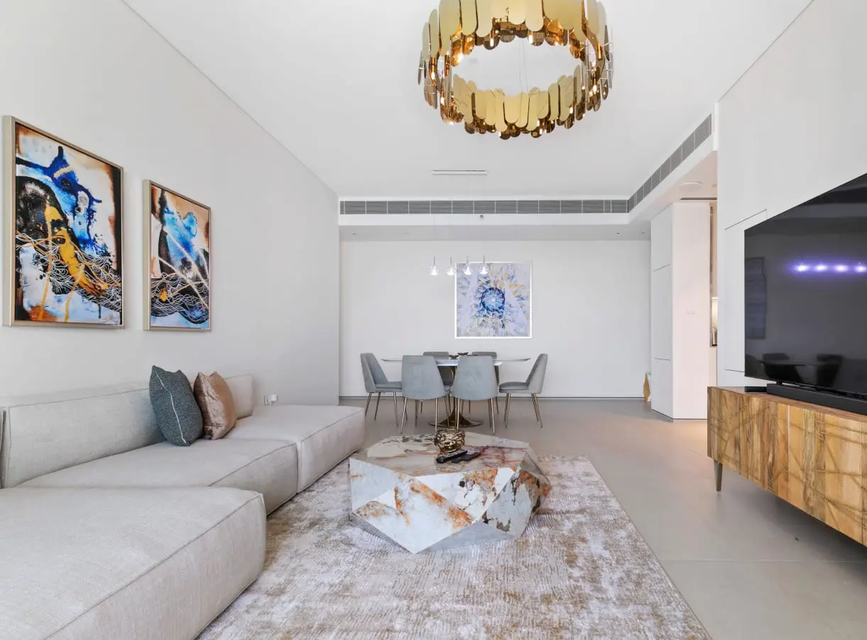 Elegant sitting area with modern classic interiors and gold accents