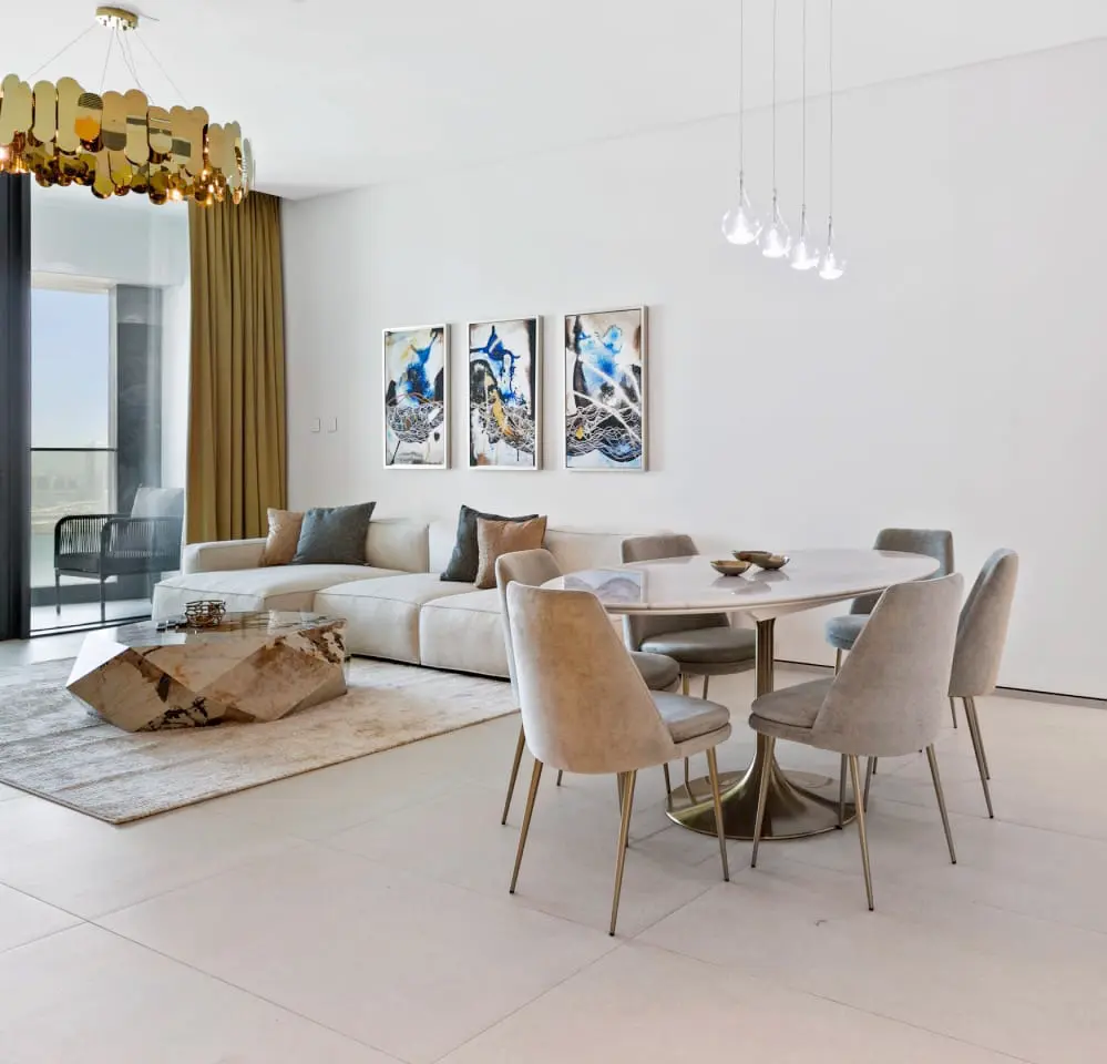 alt=&#34;Elegant dining room with contemporary art and marble table&#34;