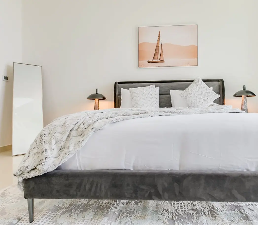 alt=&#34;Luxury bedroom interior with white and gold design&#34;