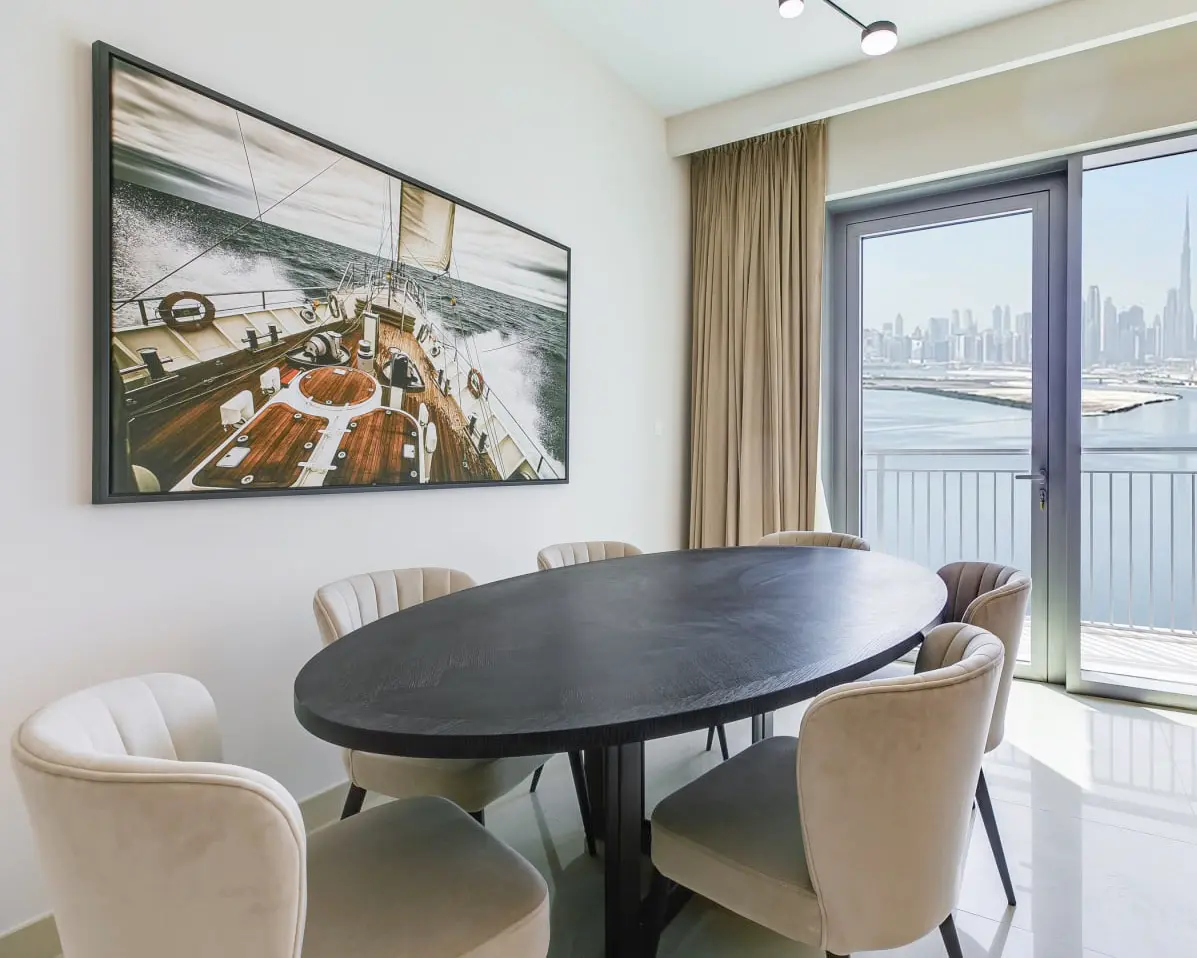 alt=&#34;Elegant dining room with contemporary art and marble table&#34;